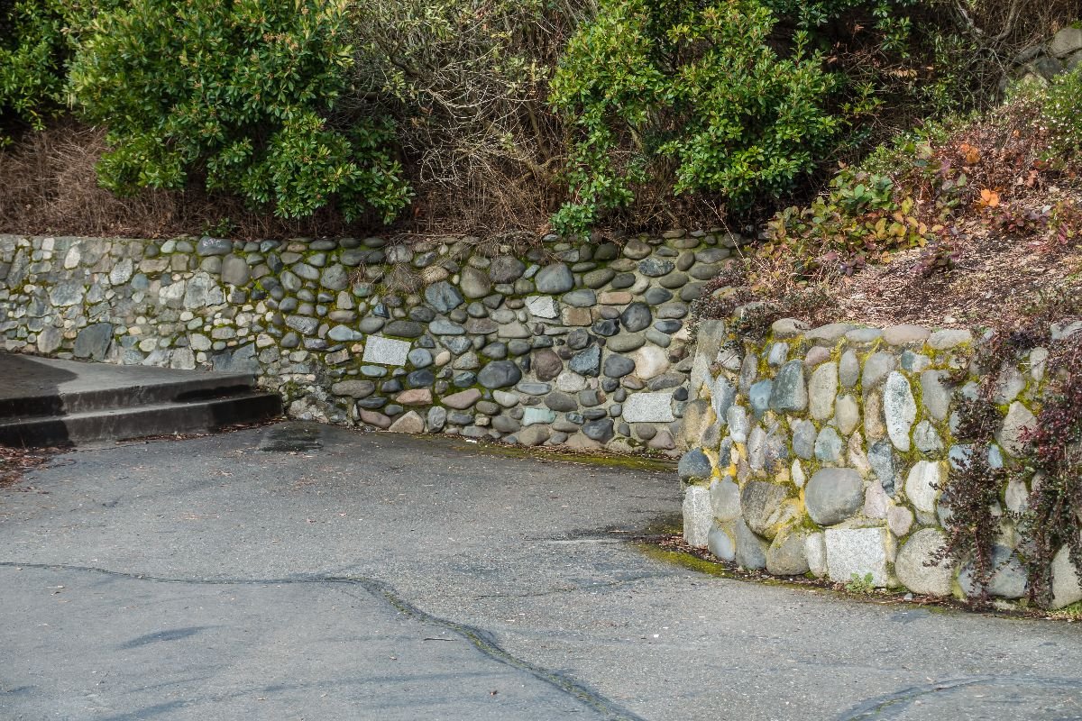 Durable retaining walls, stone walls, and masonry work designed for structural support and beautiful outdoor aesthetics.