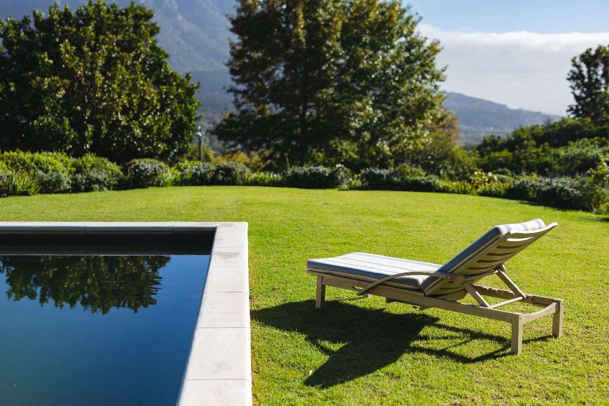 Professional landscaping solutions for pools, pool decks, and jacuzzi areas to create elegant outdoor environments.